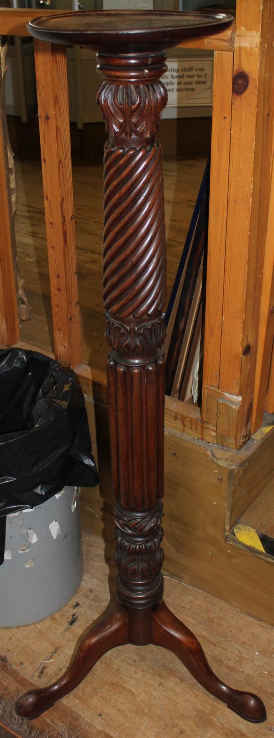 A mahogany torchere(-)